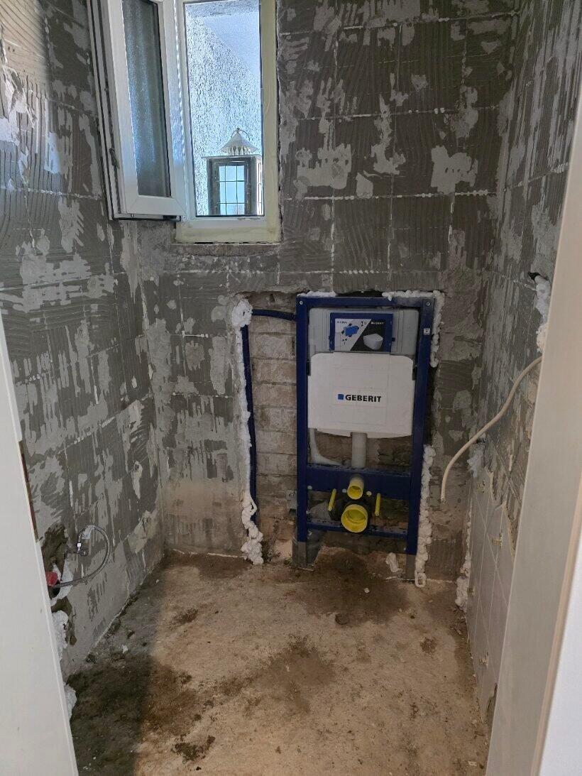 Installation WC suspendu Geberit plombier Capellen