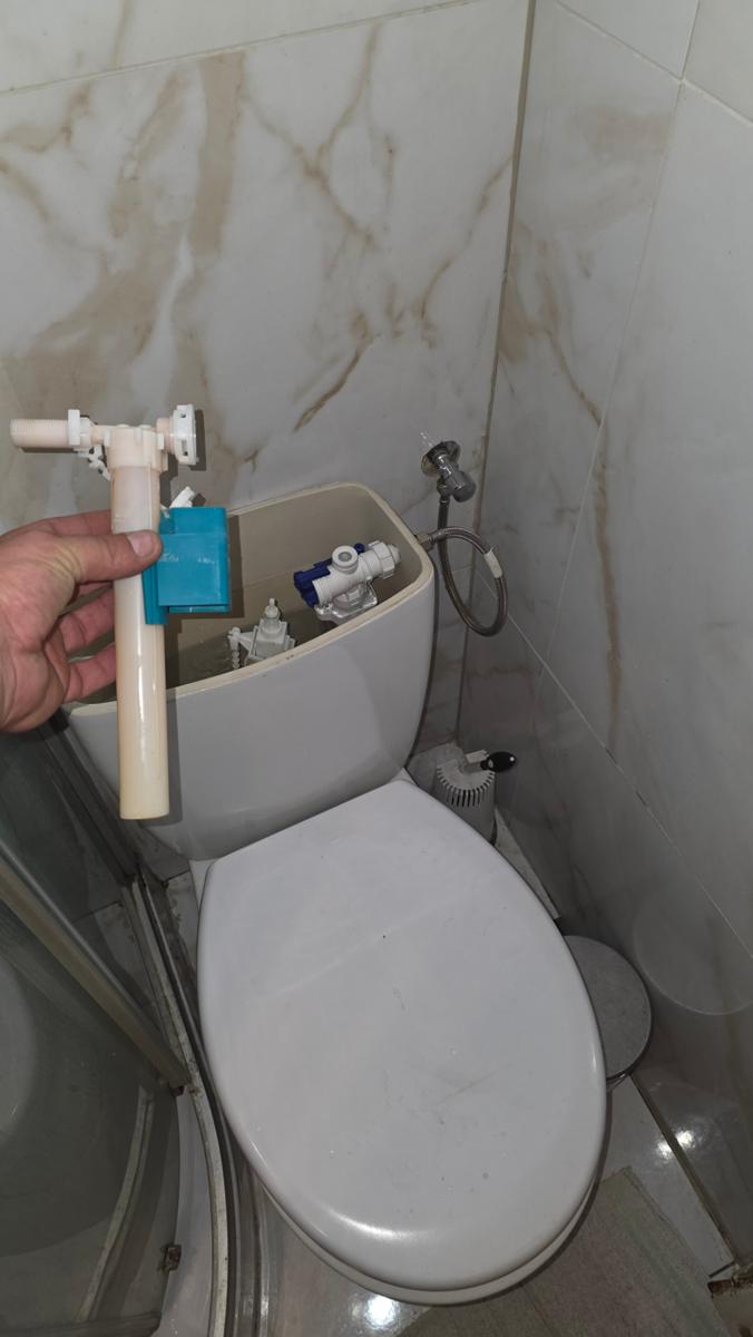 Remplacement du mécanisme de chasse d'eau WC au Luxembourg